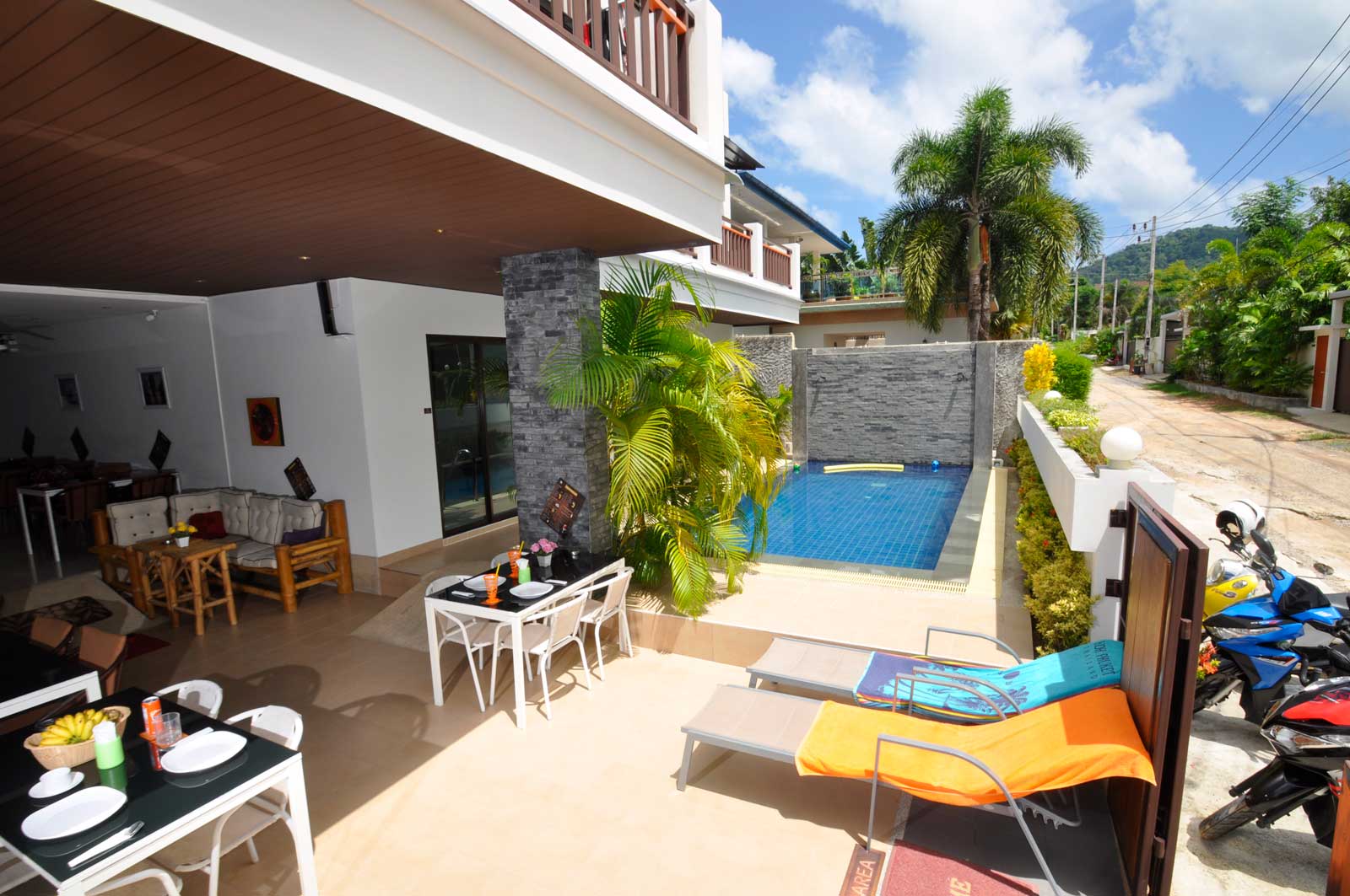 Pool, terrace and the building beyond
